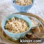 Bowl of Spaetzle with parmesan cheese on top.