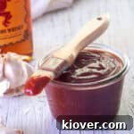 Fireball whisky spicy barbecue sauce in a glass container.