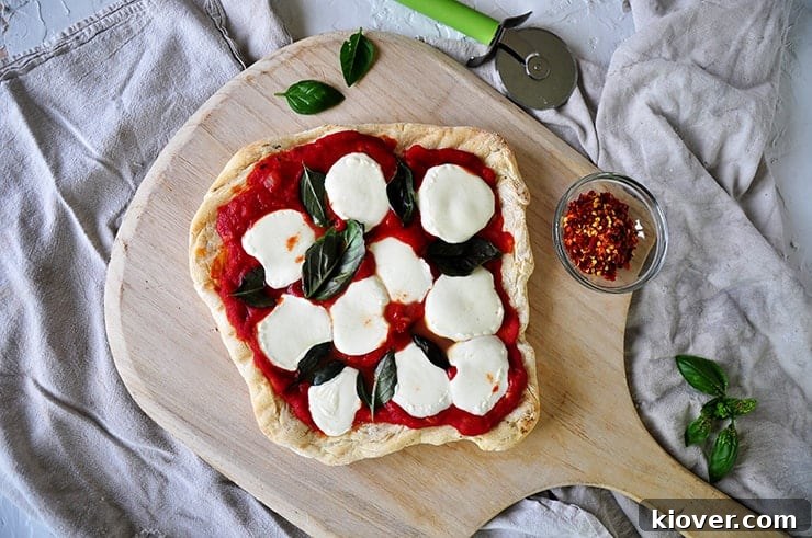 Grilled Pizza A Grilled Plain Pizza with Basil on it
