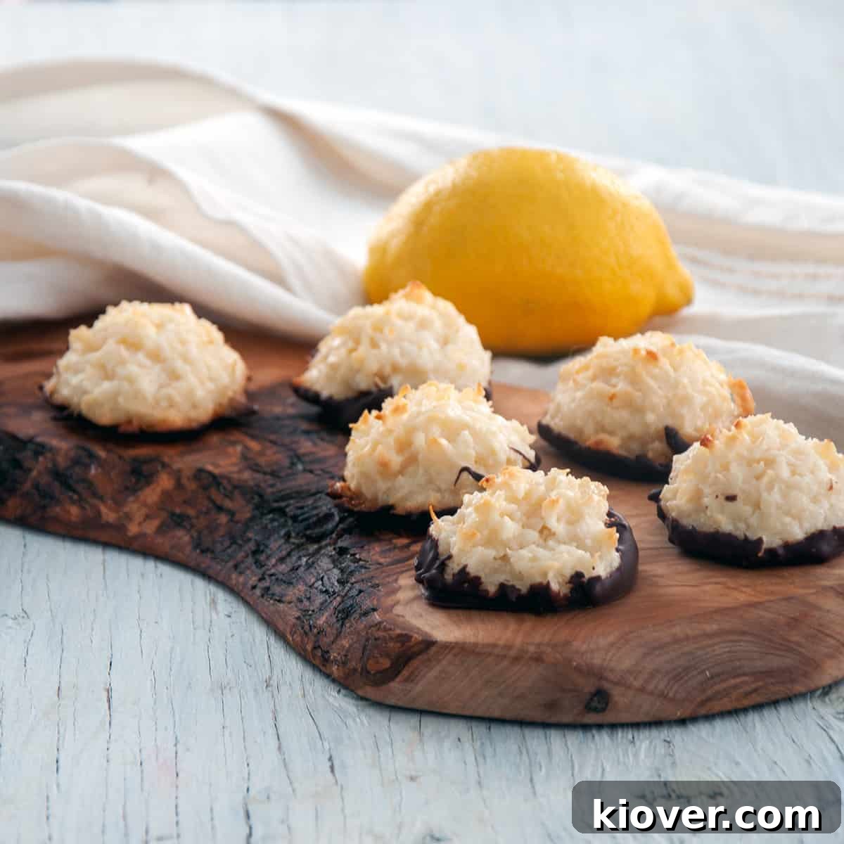 German Kokosmakronen Coconut Macaroons on a wood platter.