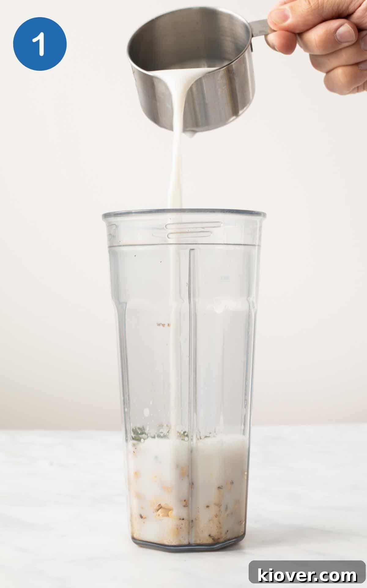Milk, Cashews, & Thyme added to a blender to make a dairy-free cream sauce.