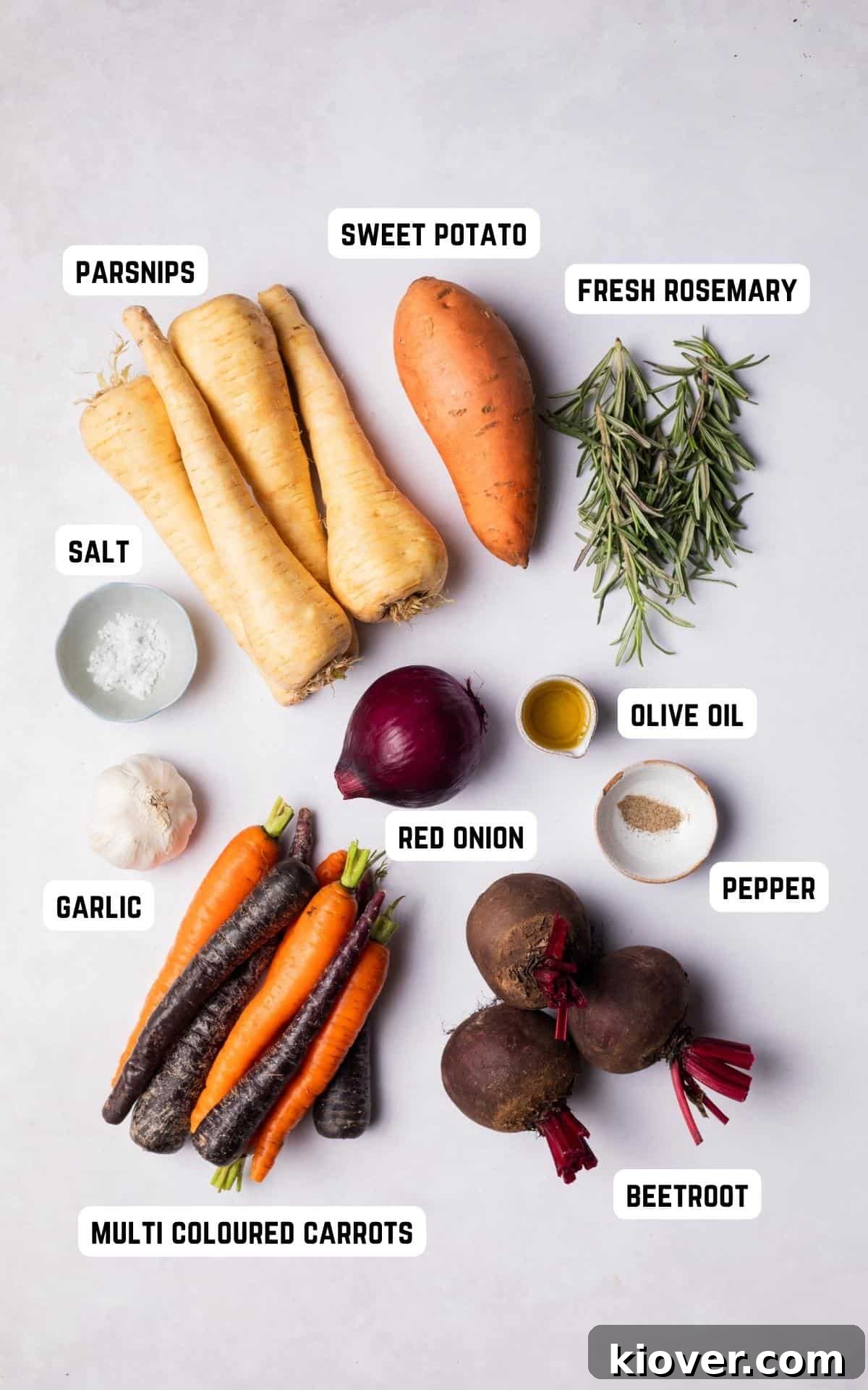 A colorful array of fresh root vegetables and herbs, ready for roasting.