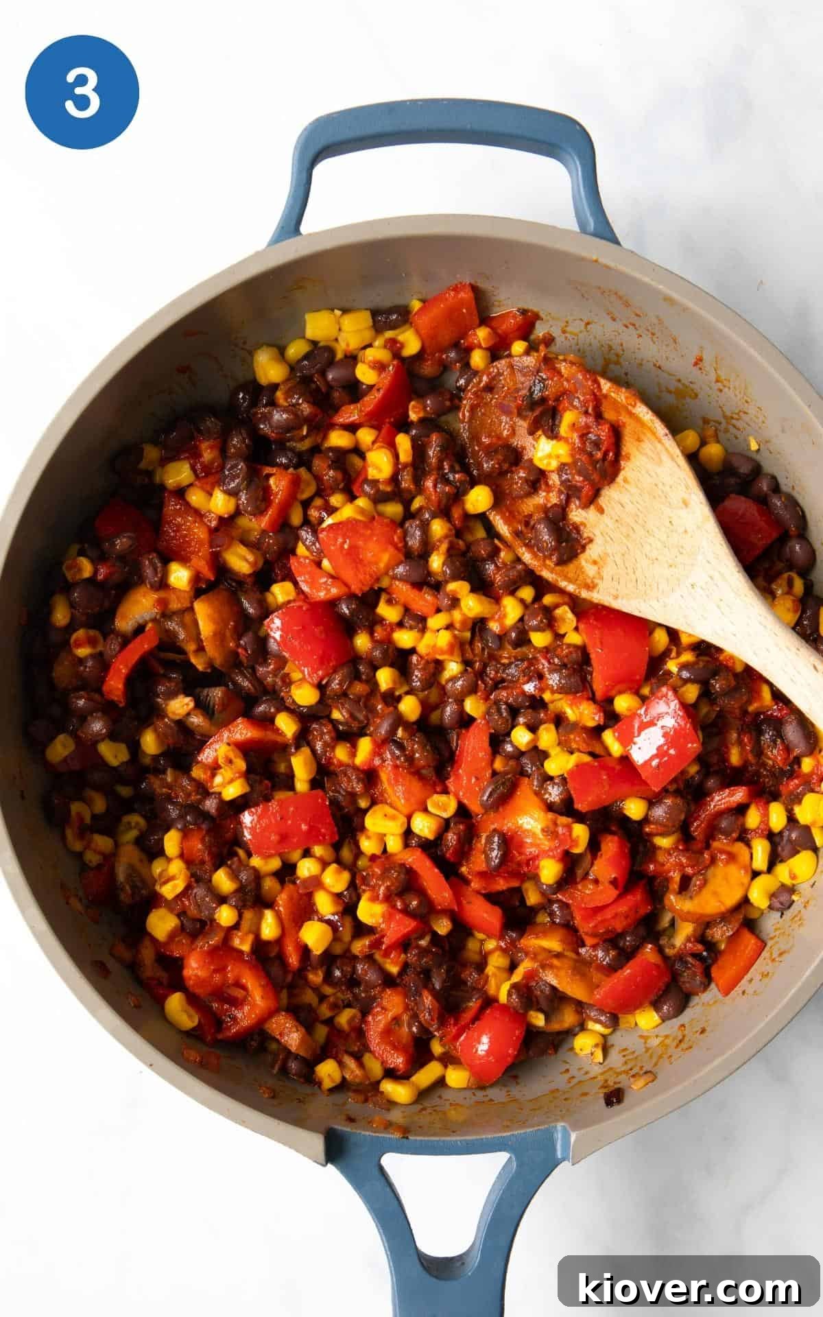 Zesty Black Bean Melts 6 Drained black beans, sweetcorn, and tomato puree stirred into the sautéed vegetable and spice mixture in the frying pan, cooking together to form the quesadilla filling.