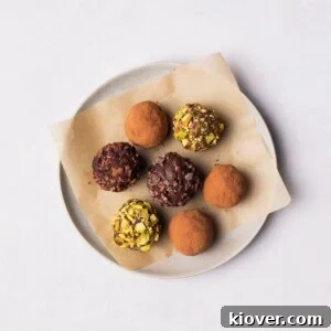 Vegan Chocolate Truffles on a plate with different toppings.