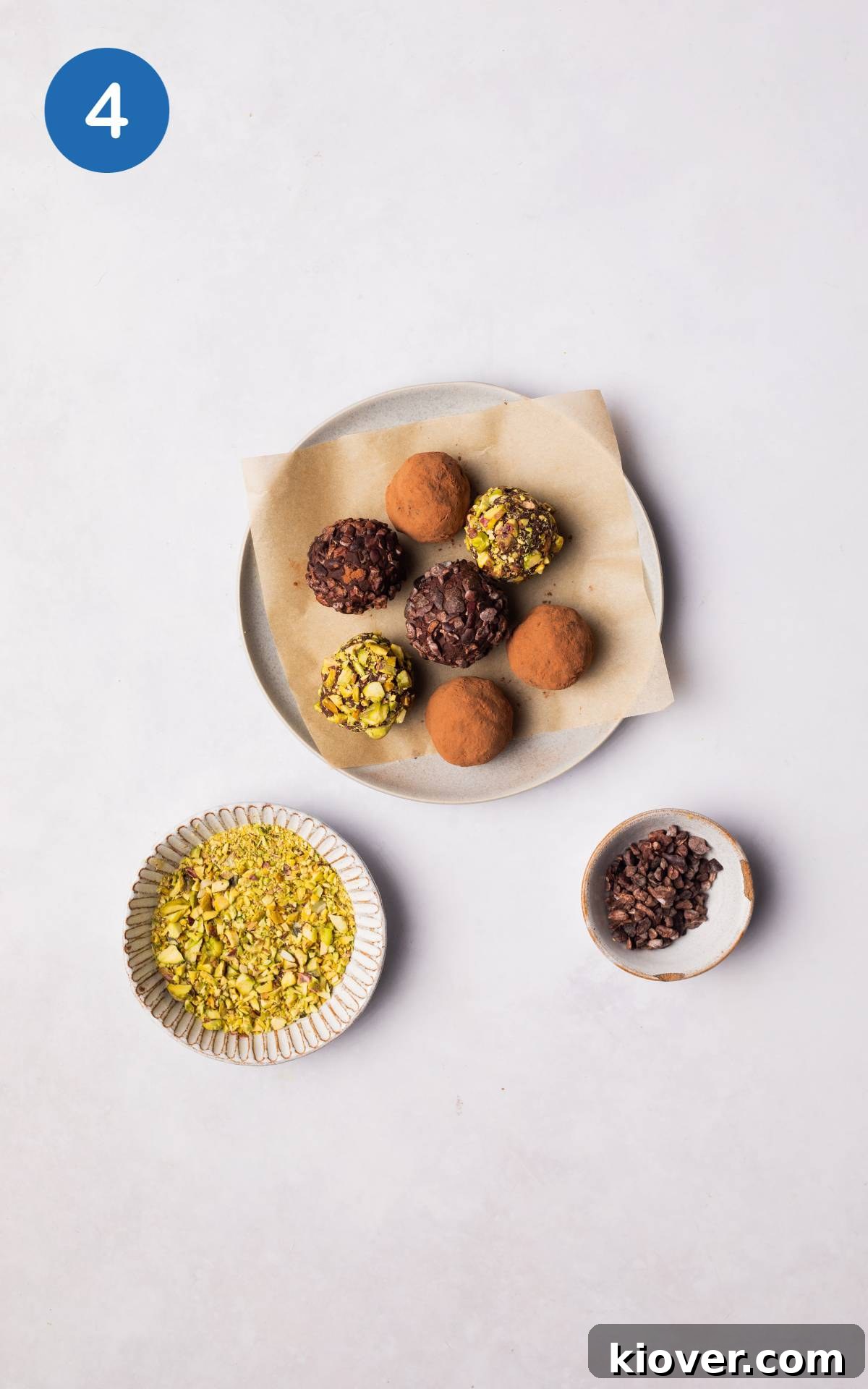 Decadent Vegan Chocolate Truffles 7 Hand-rolled raw chocolate balls coated in various toppings like pistachios and cacao nibs.