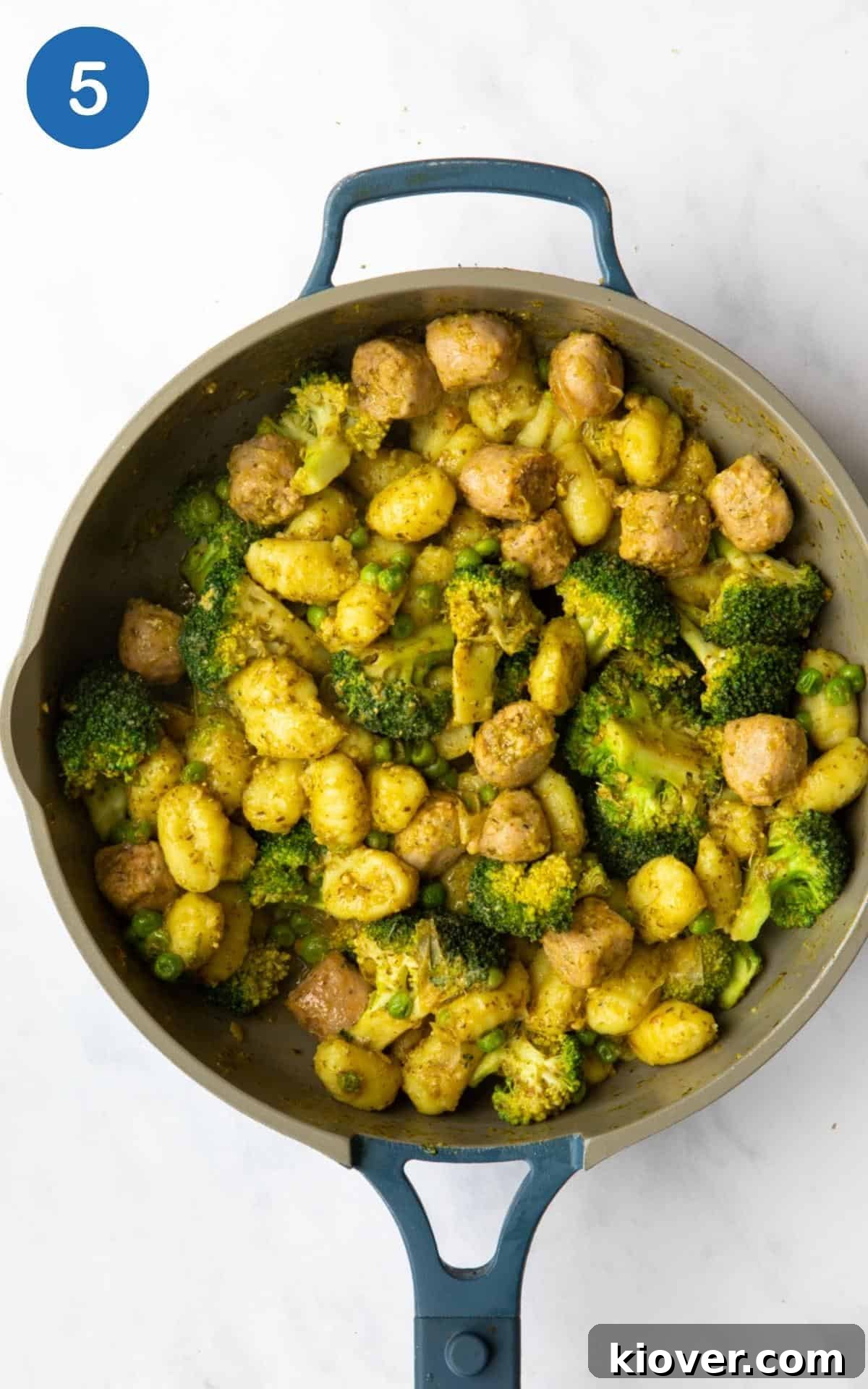Savory Sausage Pesto Gnocchi 8 Image shows pan with ready to eat Sausage Pesto Gnocchi waiting to be served.
