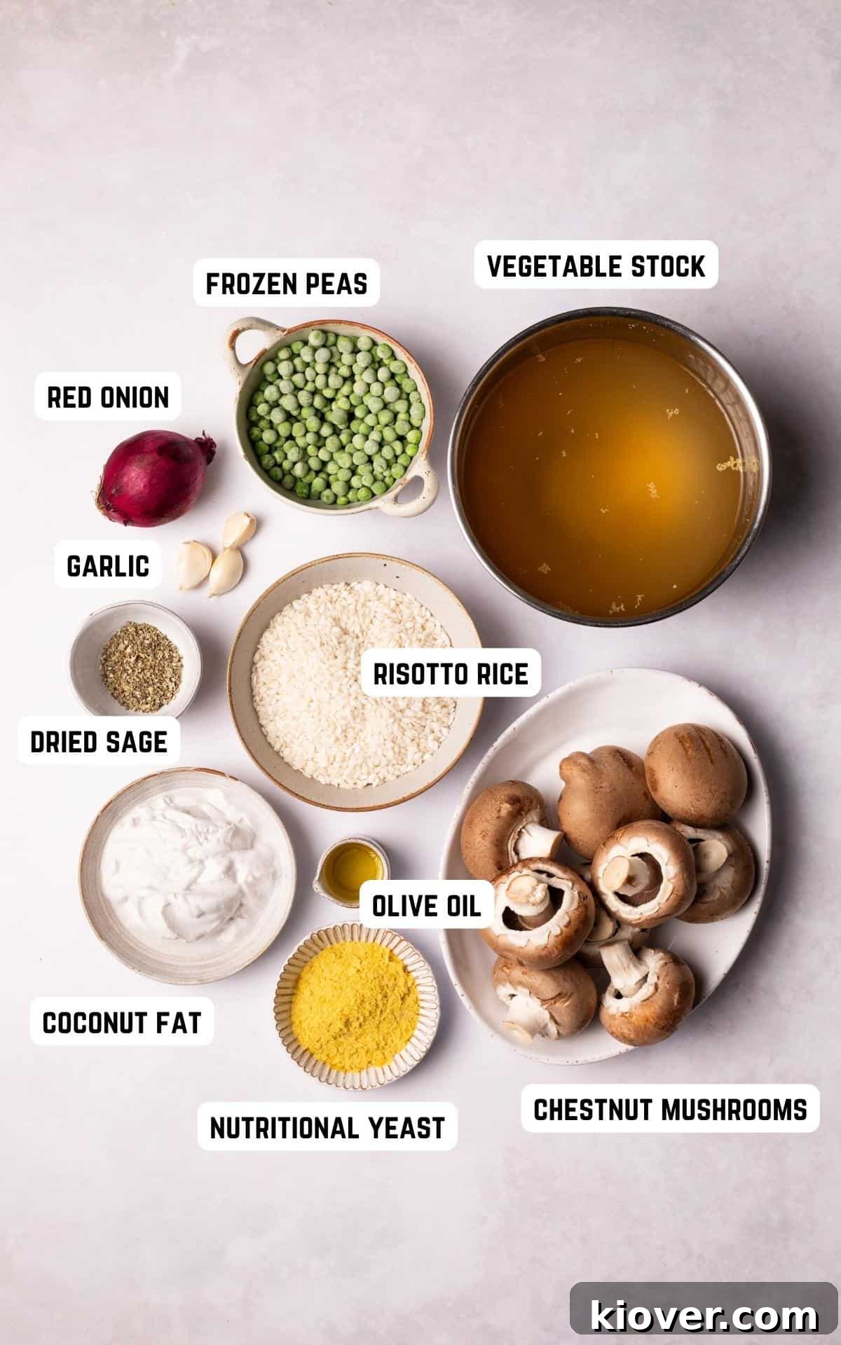 A selection of fresh ingredients, including olive oil, red onion, garlic, mushrooms, and peas, laid out for Vegan Mushroom Risotto.