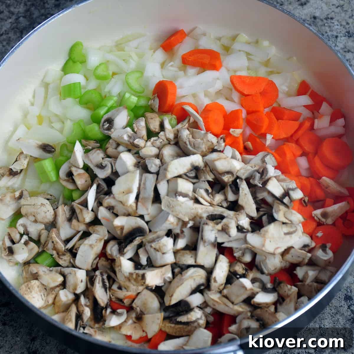 Cooking Vegetables Mixed vegetables in a large sauce pan after butter has melted.
