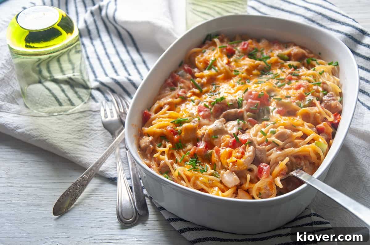 Chicken Spaghetti casserole in a white dish.