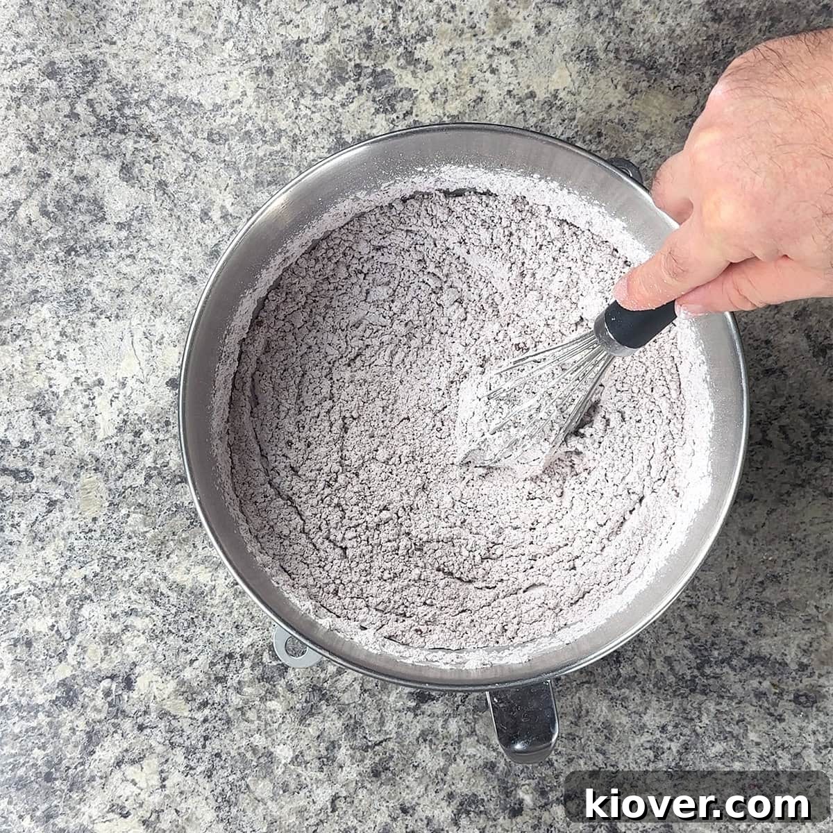 Powdered sugar and cocoa mixed together in a bowl.