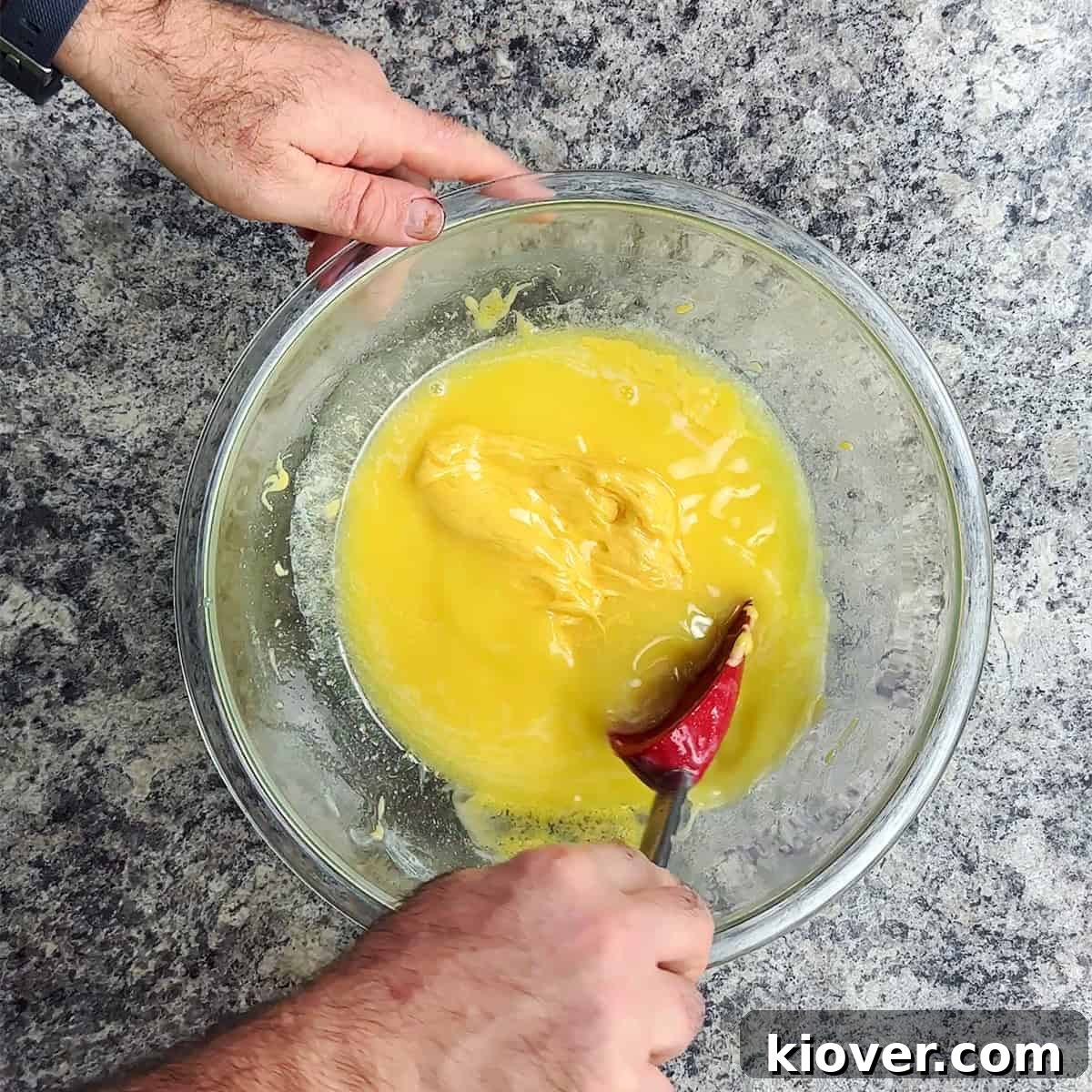 Melted Velveeta and butter in a microwave-safe bowl.