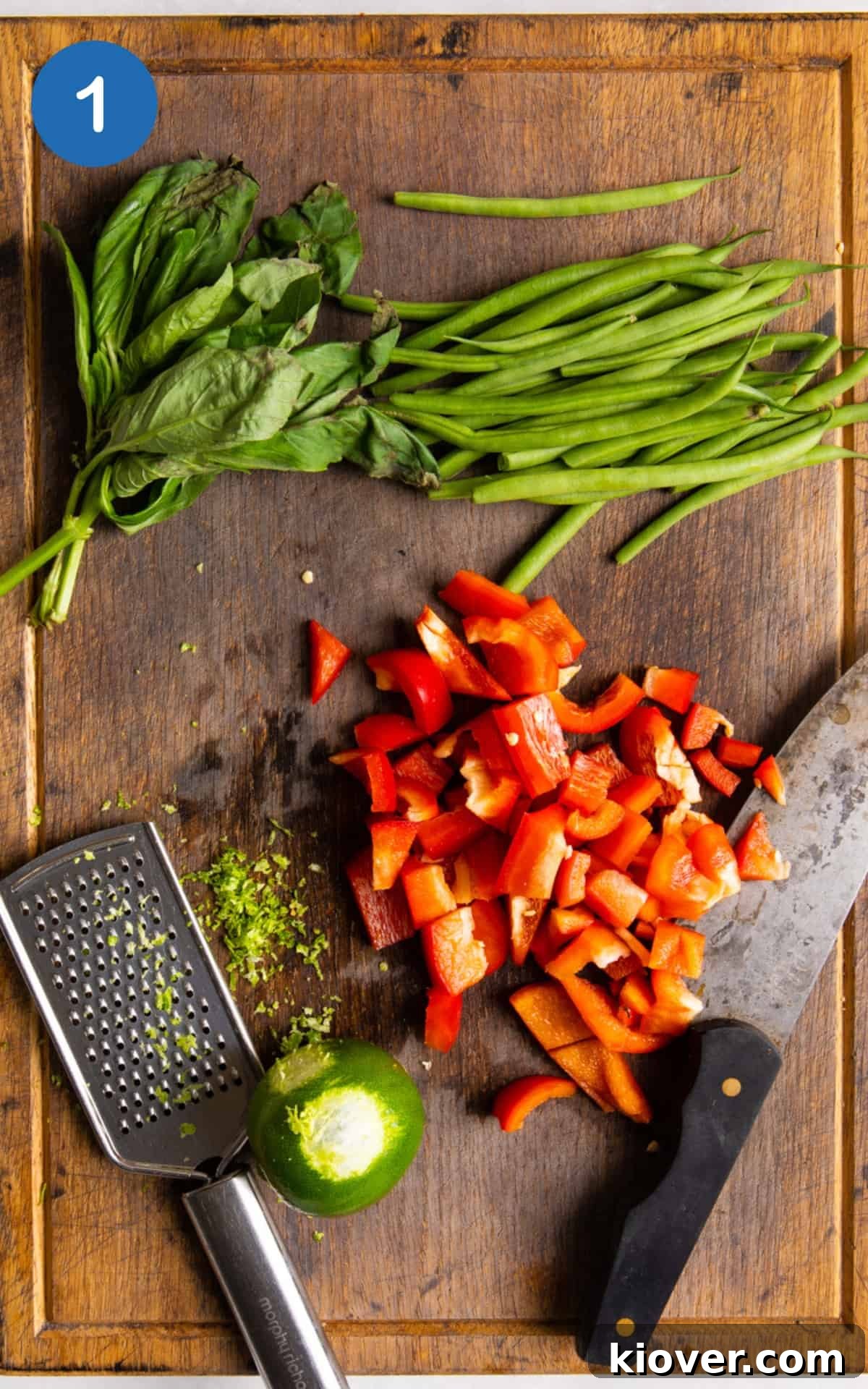 ingredients chopped up on wooden chopping board.