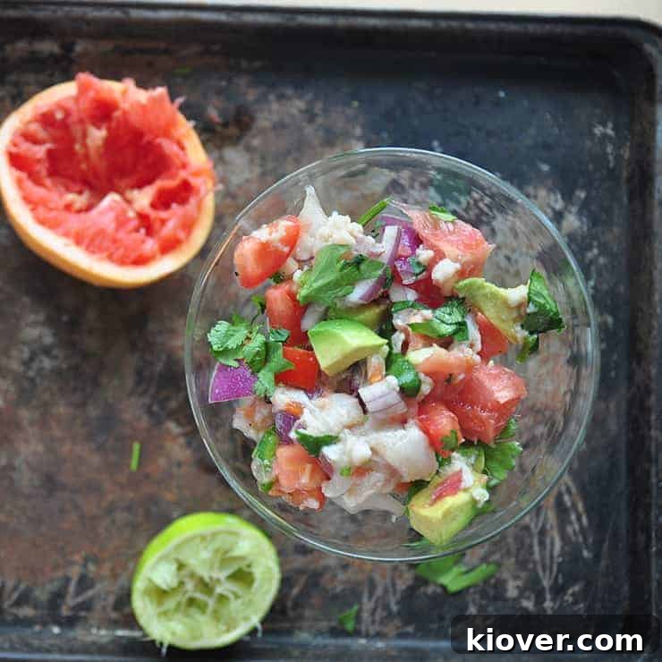 Finished ceviche expertly mixed and ready to be served, showcasing vibrant colors and fresh ingredients