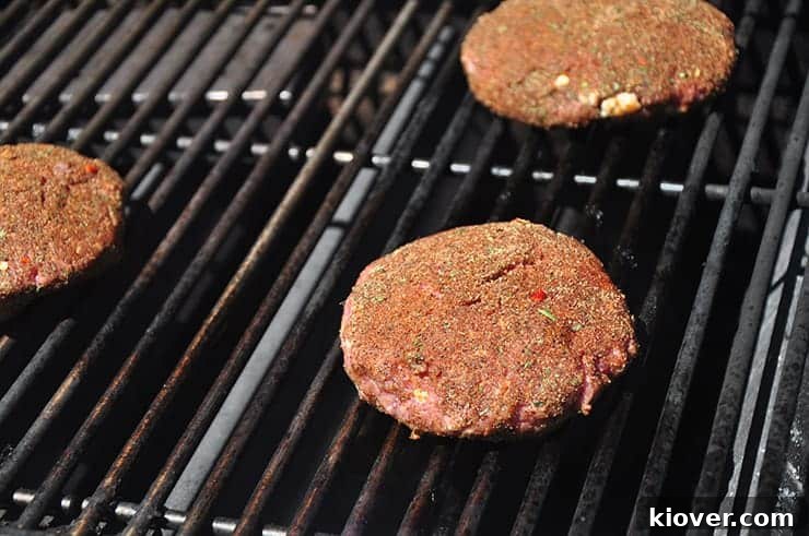 Grilling Seasoned Burger Patties.