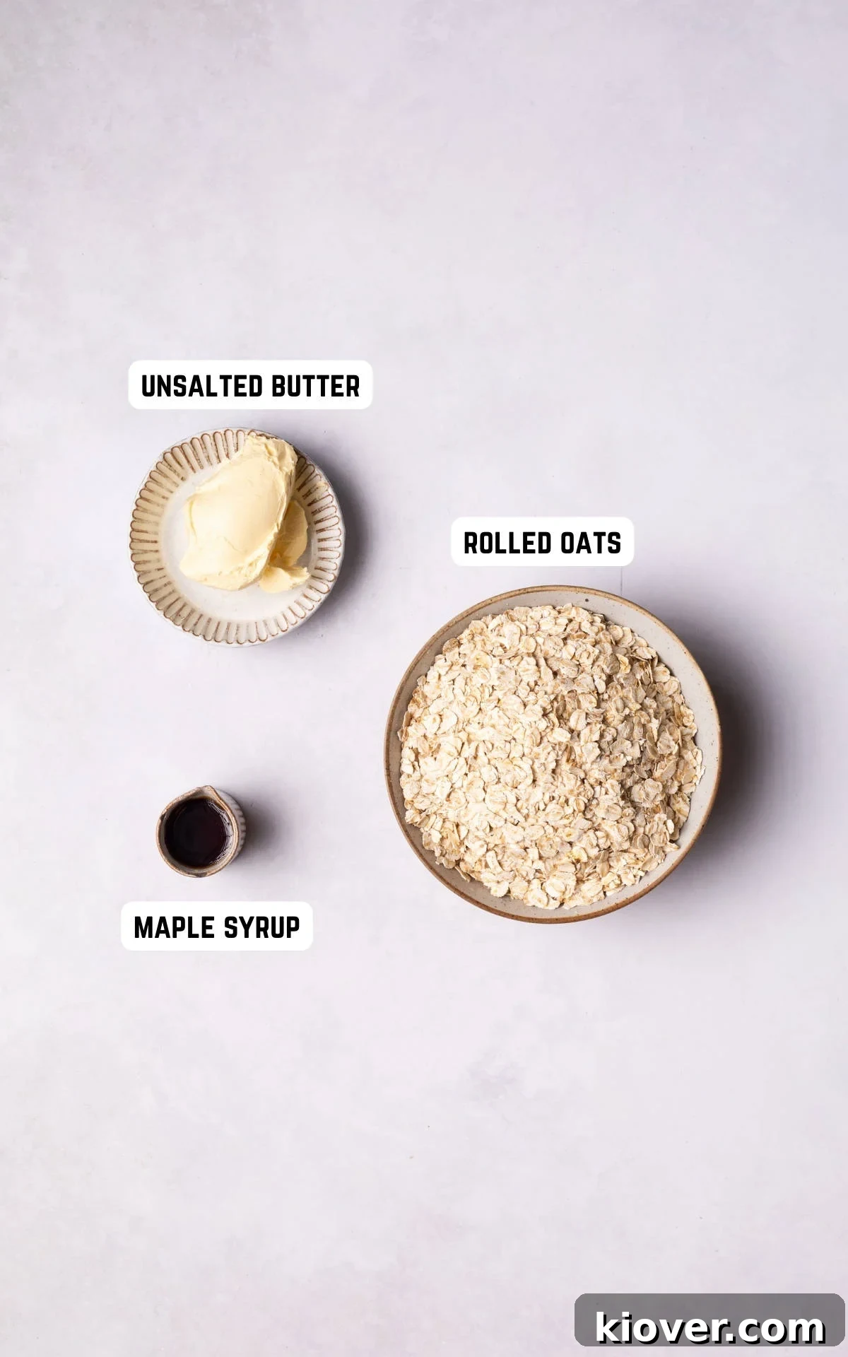 Ingredients laid out to make Oat Crumble Topping: rolled oats, maple syrup, and unsalted butter.