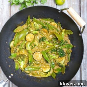 Vegetable Thai Green Curry in a wok.