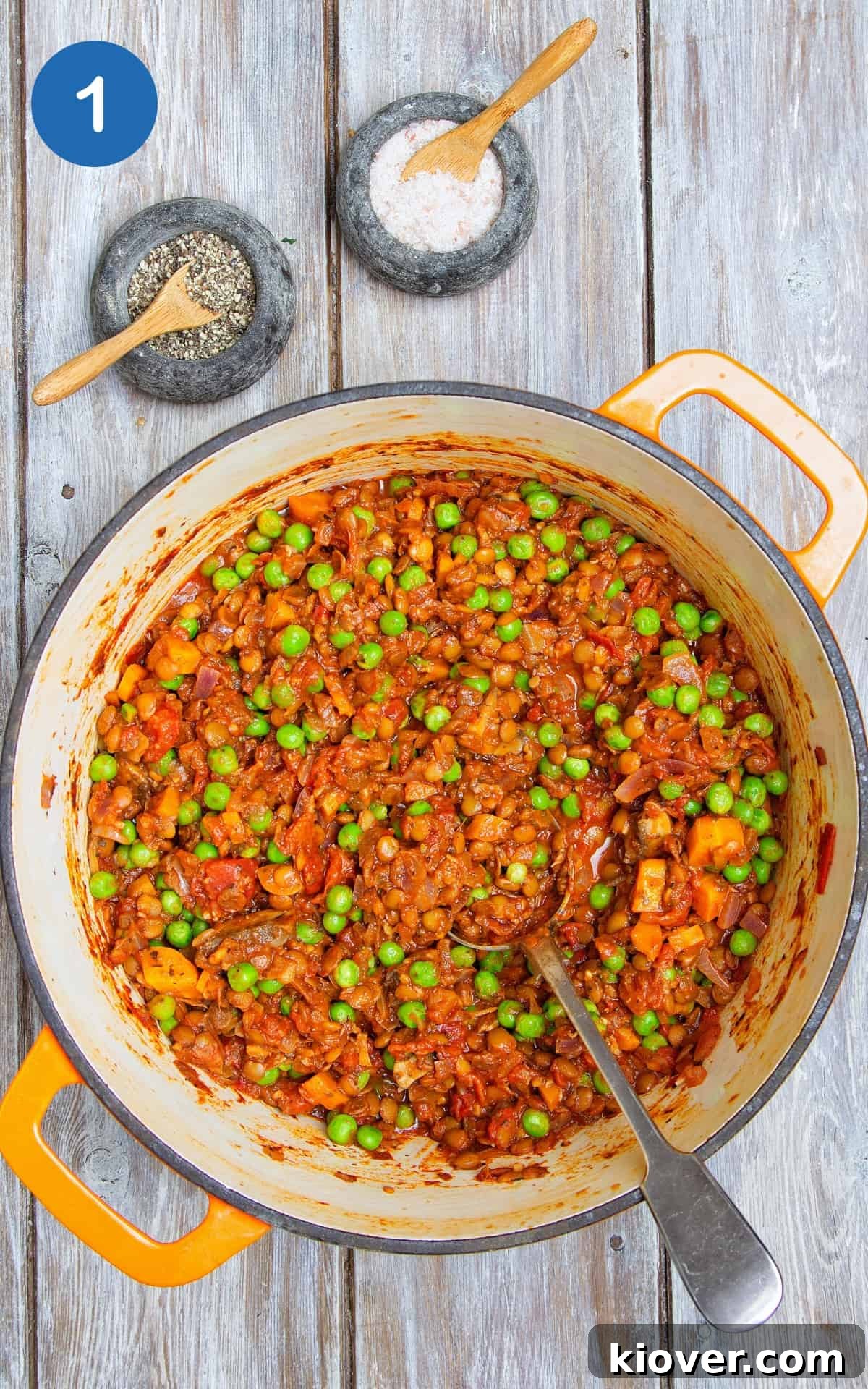 The vibrant mixture of cooked vegetables, lentils, and herbs for Vegan Shepherd's Pie simmering in a large pot.