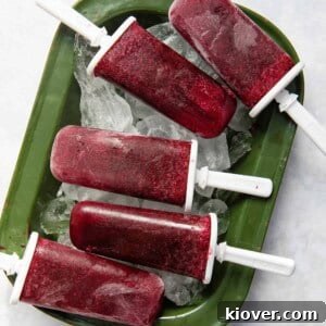 Refreshing homemade blueberry ice lollies, perfect for a hot day.