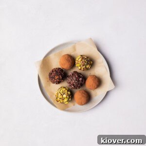 Vegan Chocolate Truffles on a plate with different toppings.