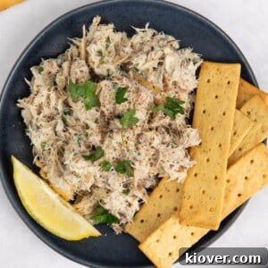 Smoked mackerel pate with crackers, ready to be served and enjoyed.