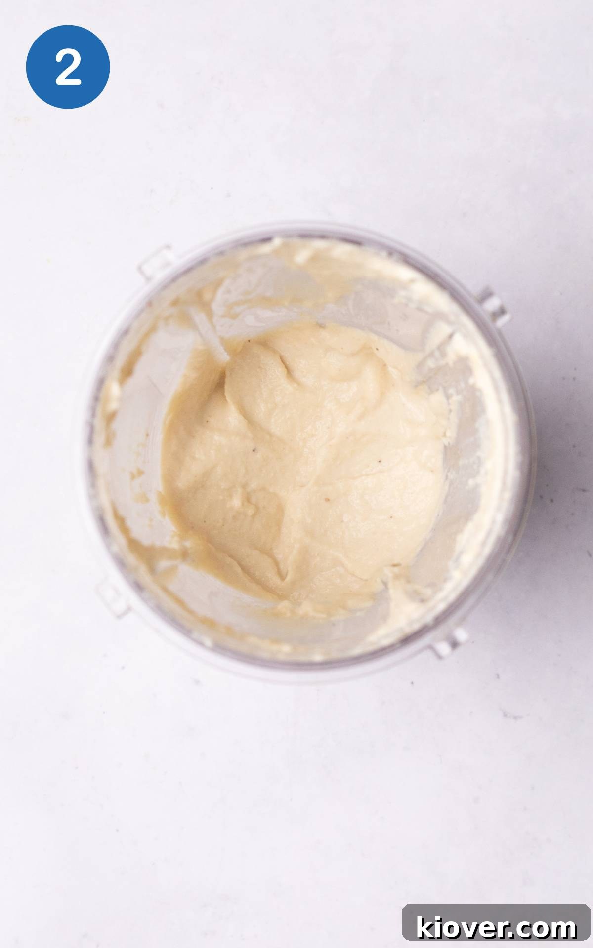 Creamy Vegan Sour Cream 5 All the vegan sour cream ingredients blending together in a high-speed blender until smooth.