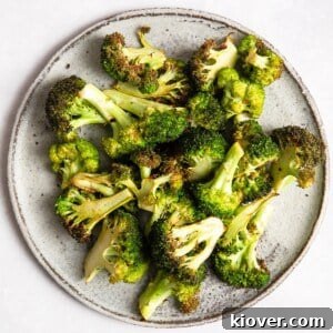 Crispy Air Fryer Broccoli served on a grey plate.