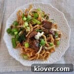 Overhead view of homemade Beef Chow Mein in a serving bowl.