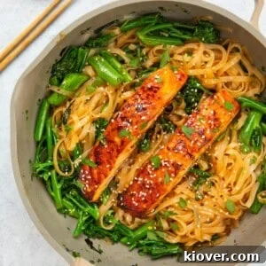 Teriyaki salmon noodles with broccoli.