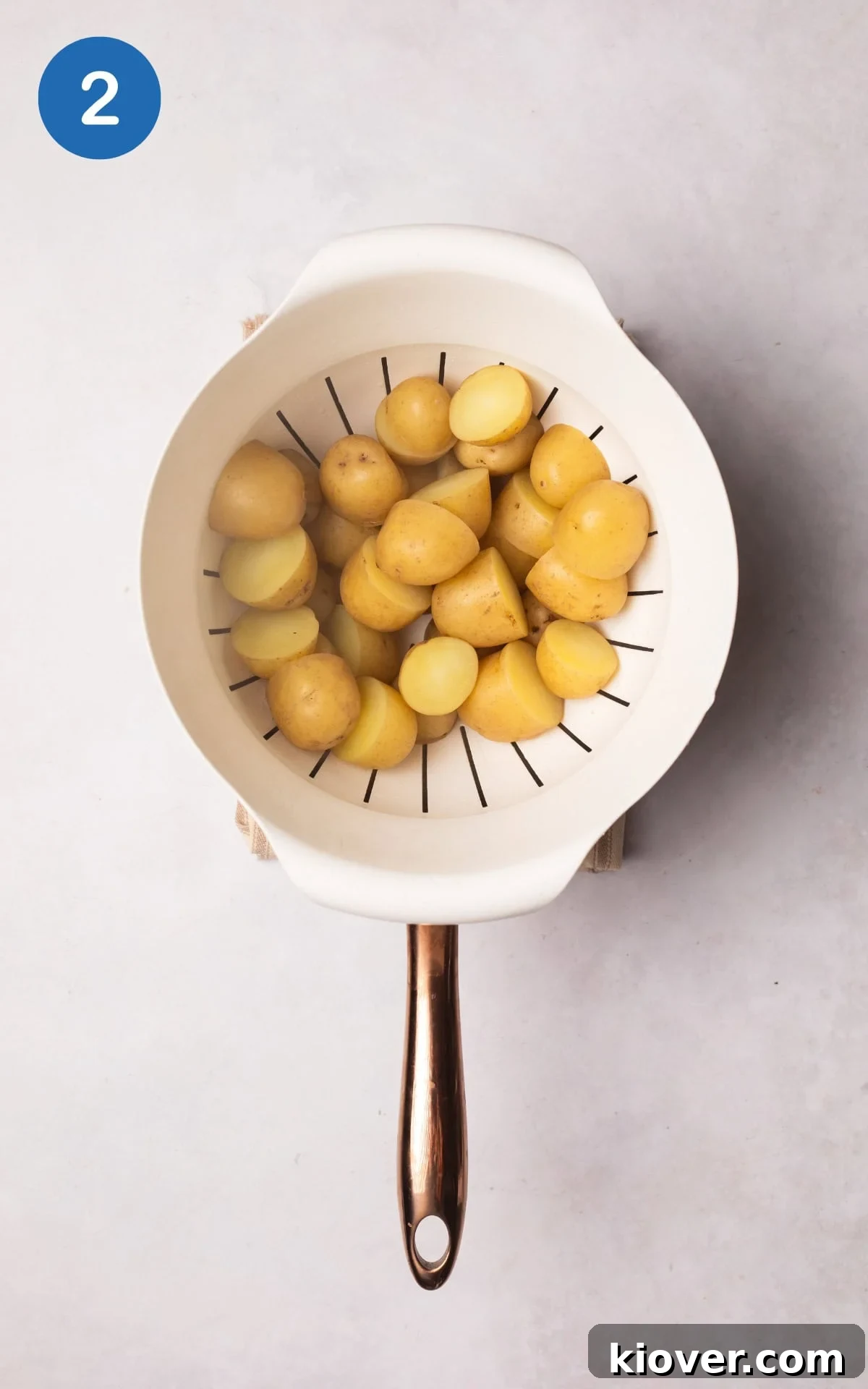 Baby potatoes in a strainer.