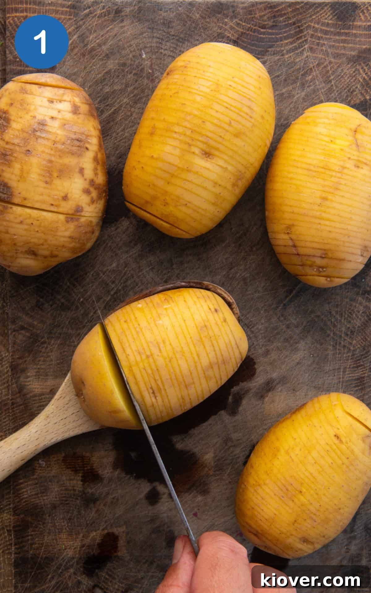 slicing thin cuts all the way across the potato with a sharp knife, with a wooden spoon underneath to prevent cutting through.