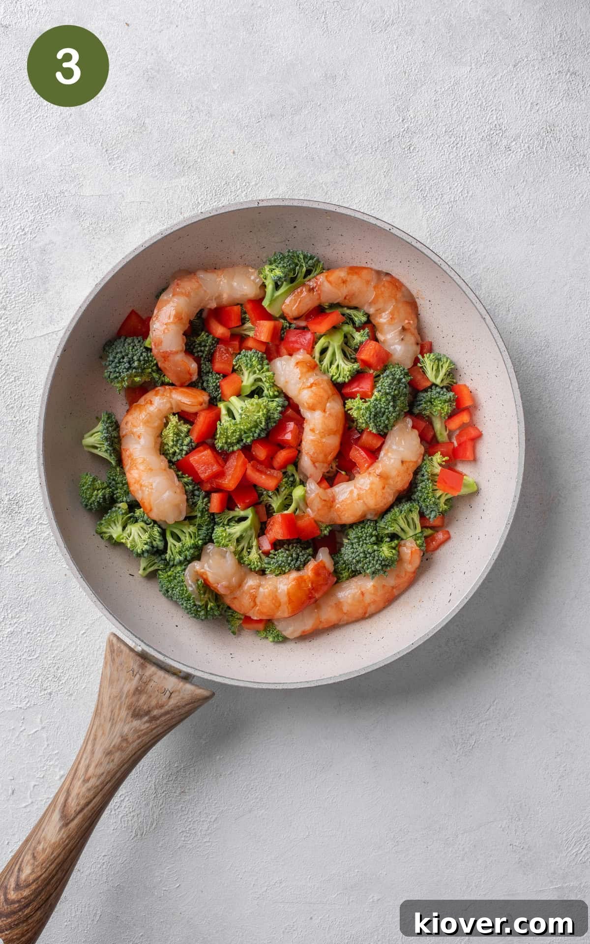 Savory Prawn Noodles 6 Adding red pepper, broccoli, prawns and tamari sauce to the large frying pan,
