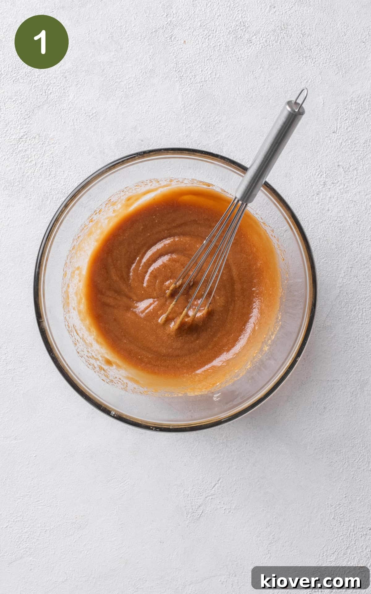 All ingredients for the satay dressing mixed in a bowl, creating a smooth, creamy texture.