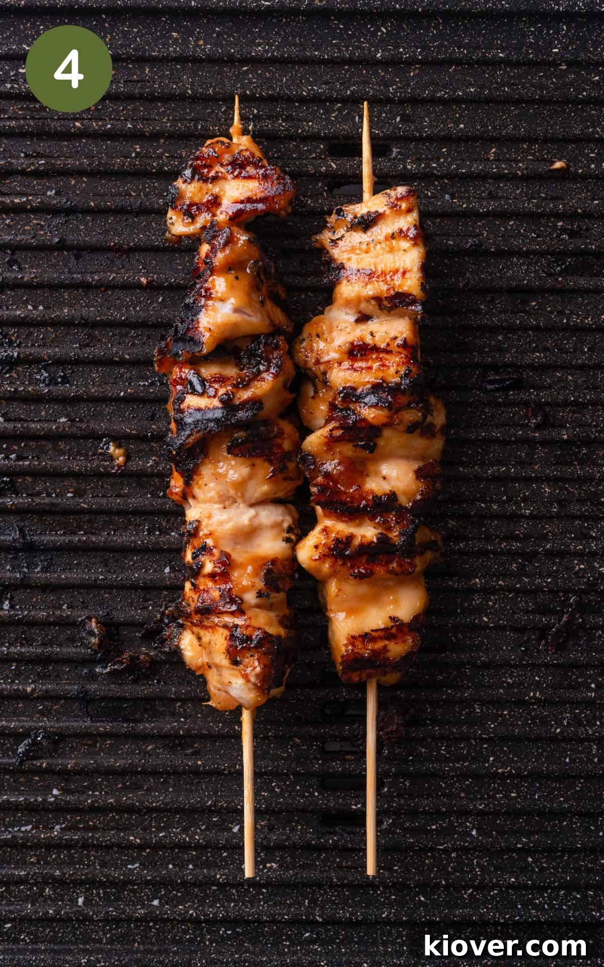 Bite-sized chicken pieces skewered and perfectly grilled, showing beautiful char marks.