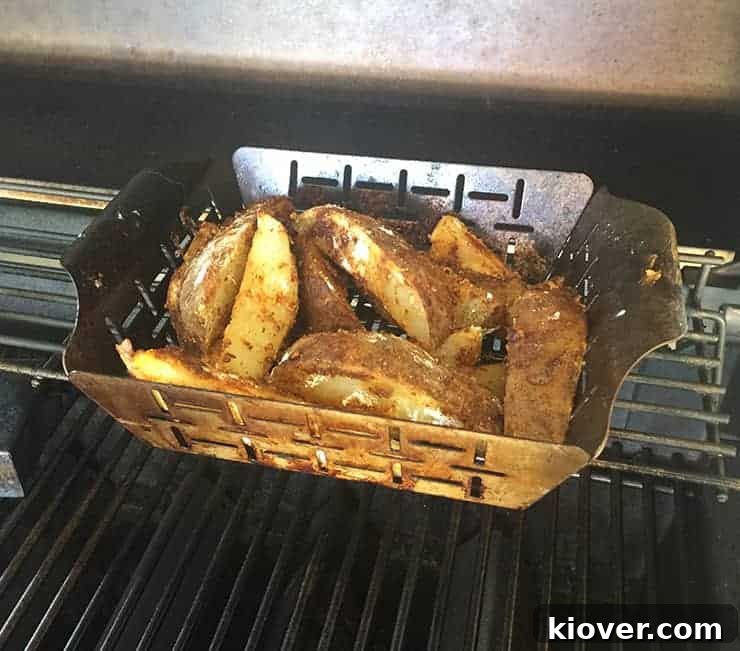 Grilling Wedges Grilling the potato wedges in my Weber vegetable tray