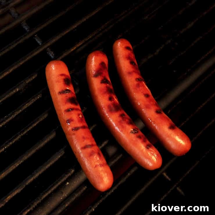Charred Dogs Three Ambassador Weiners on my Weber Grill