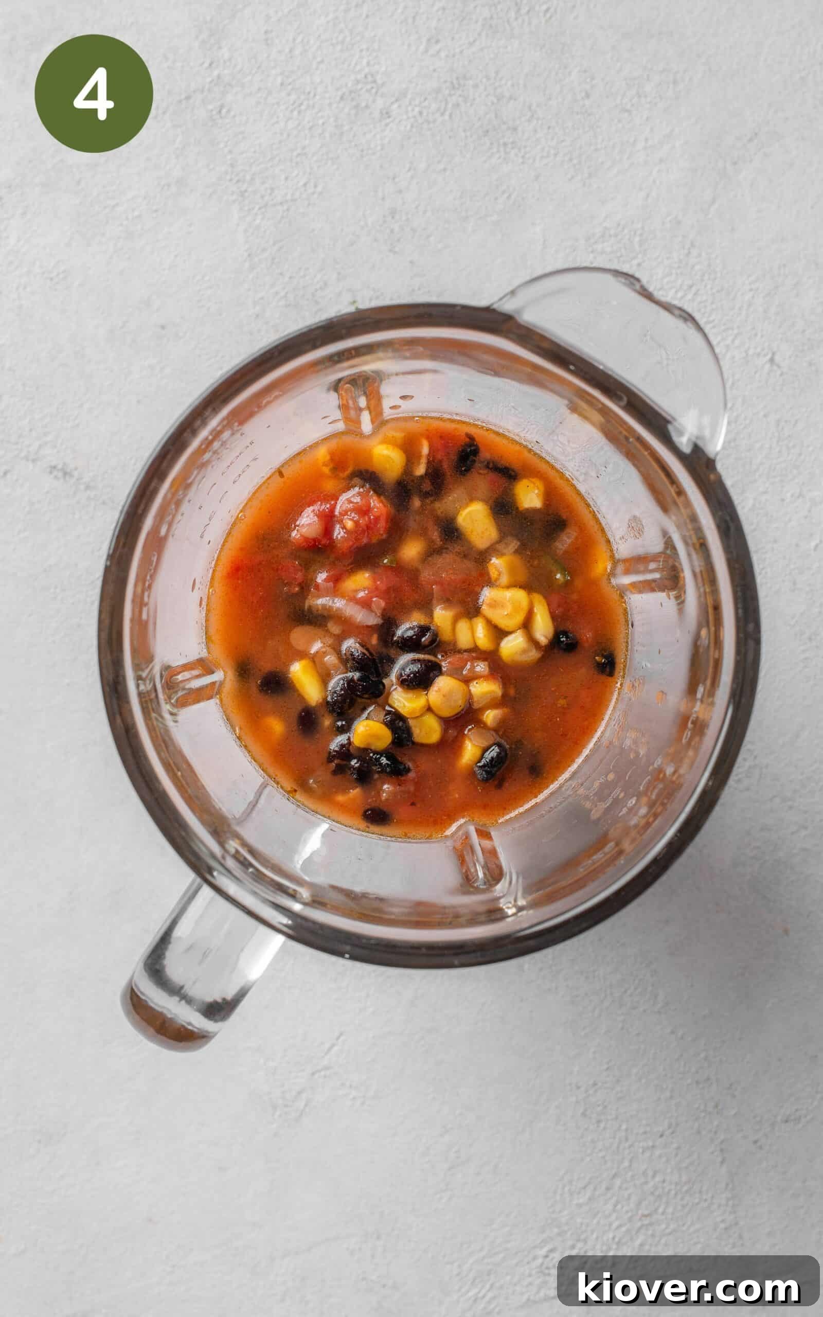 Vibrant Fiesta Soup 7 Portion of Mexican soup in a food blender, ready for blending to create a thicker consistency.