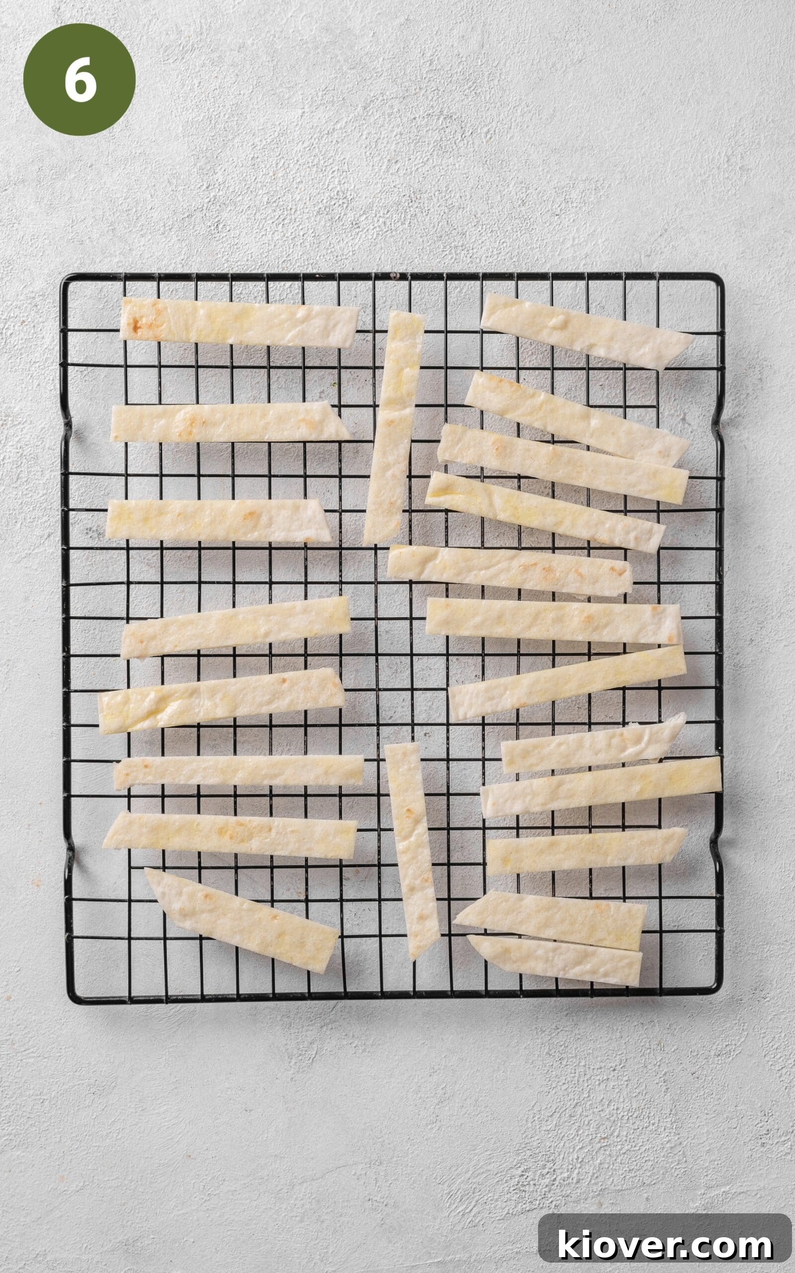 Vibrant Fiesta Soup 9 Crispy tortilla strips cooling on a wire rack after being toasted, ready to be added to the Mexican soup.