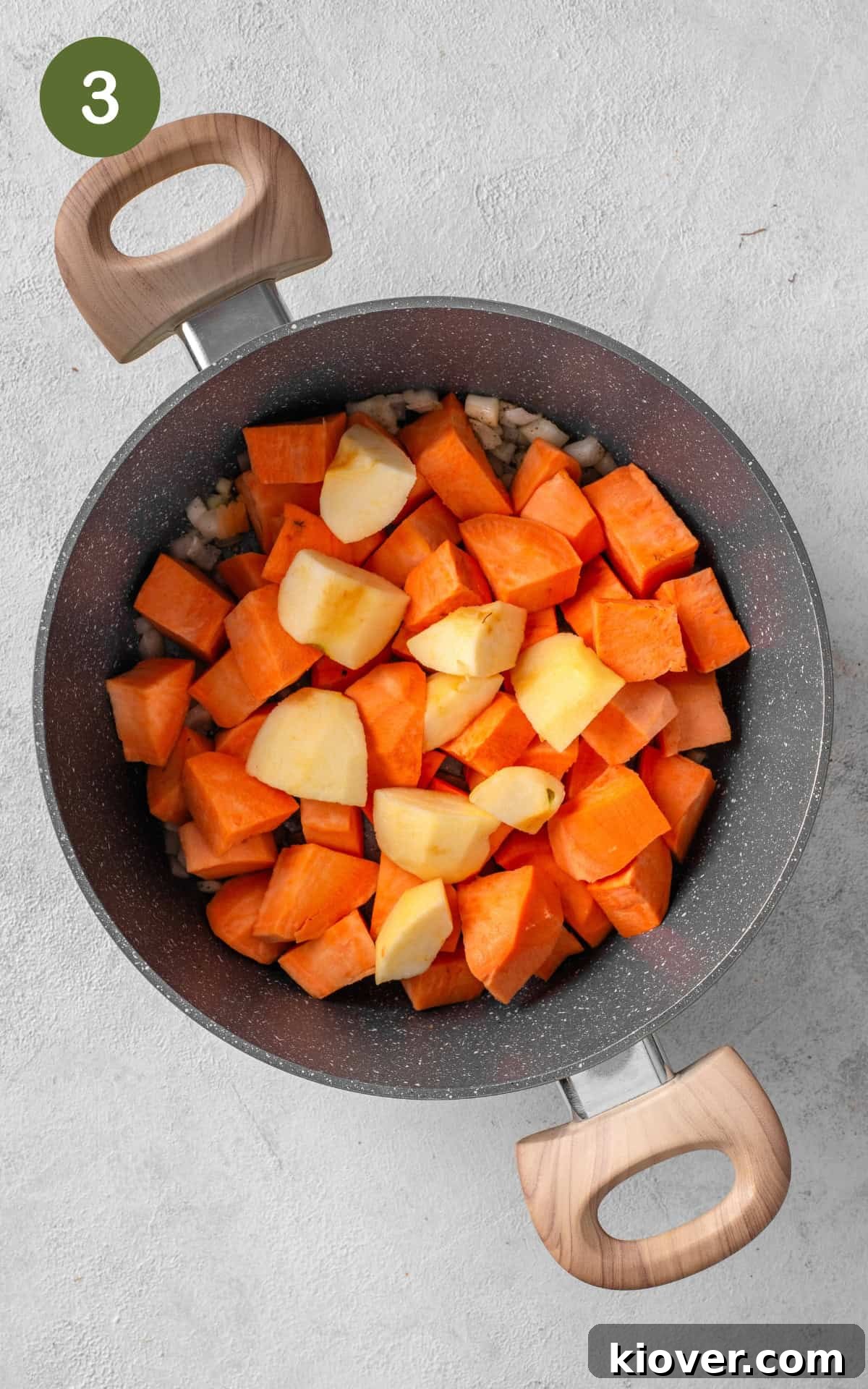Spiced Sweet Potato Warmth 6 Sweet potato and apple pieces added to a sauce pot with sautéed onions.