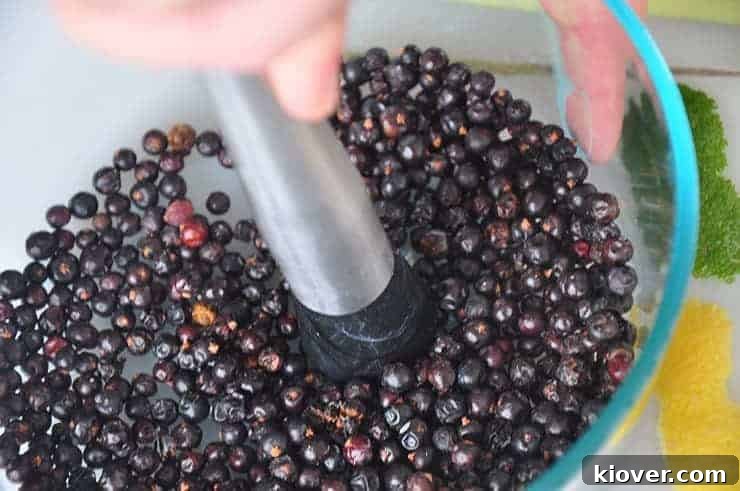 Muddling and Breaking the Juniper Berries.