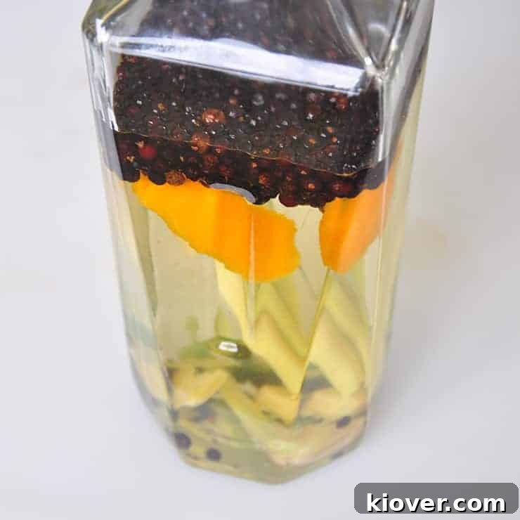 All ingredients and vodka in bottle to make gin.