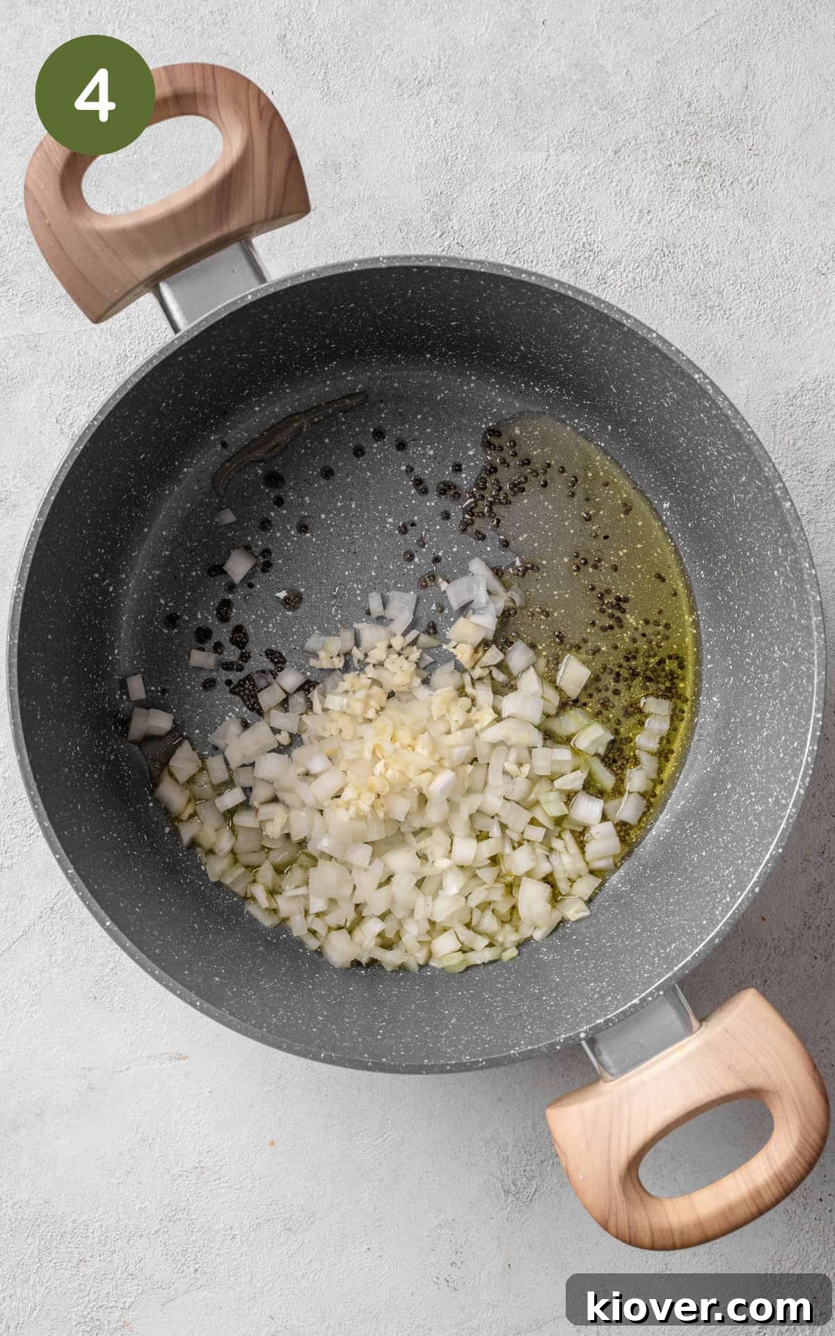 Garlic, onion and spices in a pan.