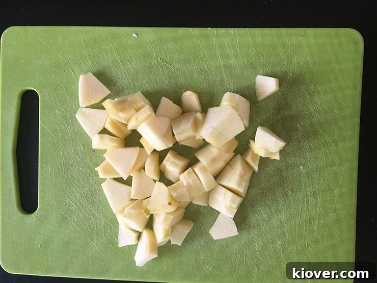 Chopped Apples Chopped apple on cutting board.
