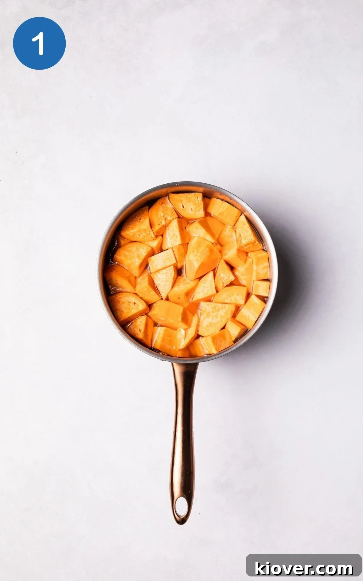 Sweet potatoes in pot with water.