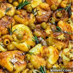 Smashed potatoes with olives.