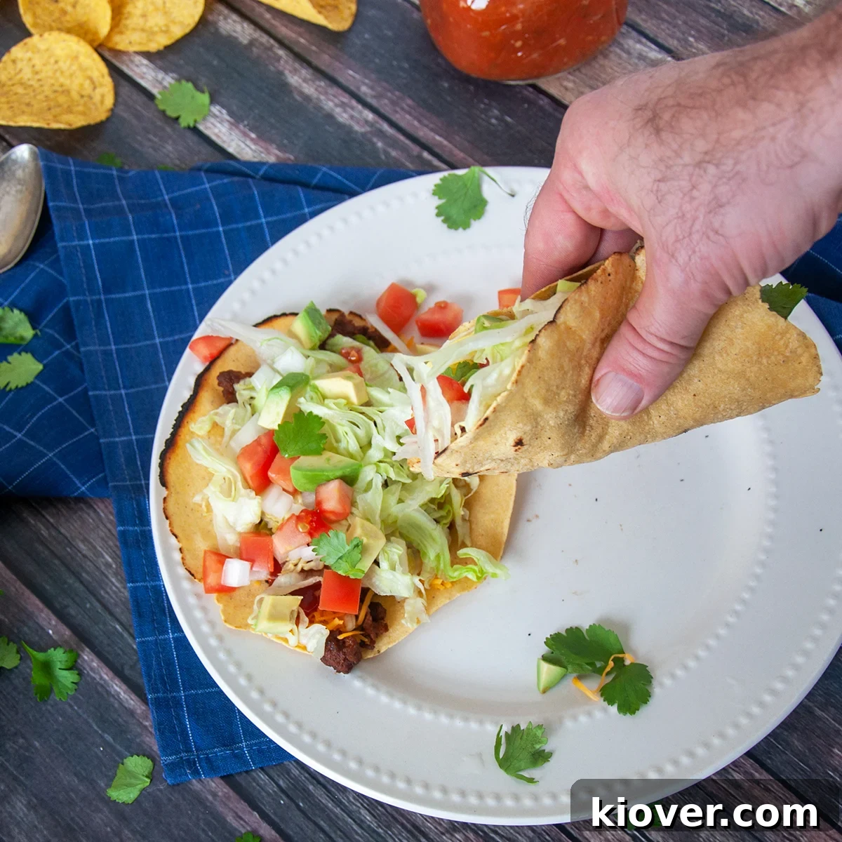 A set of tacos on homemade tortillas.
