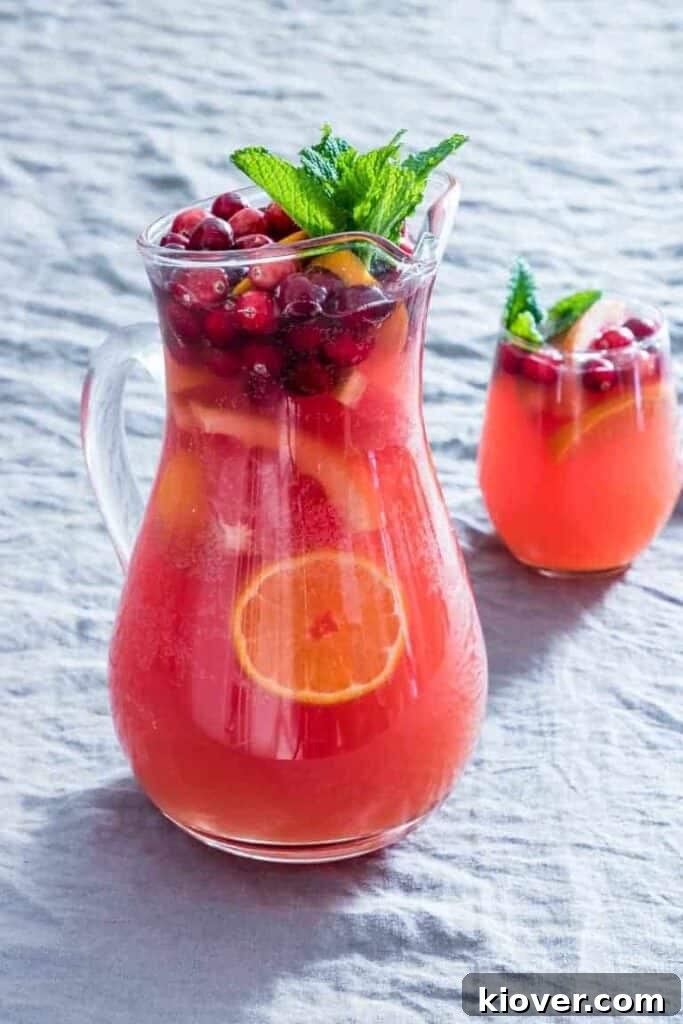 Easy Festive Fruit Punch recipe with various fruit options for parties.