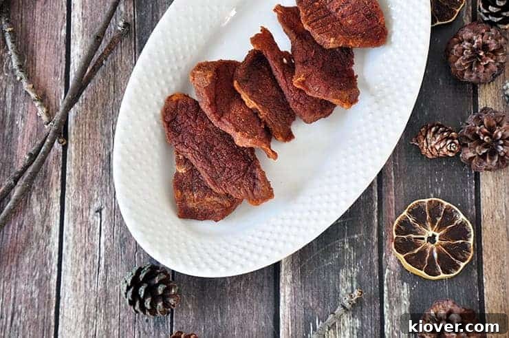 Finished Beef Jerky Overhead Beef Jerky on a white plate.