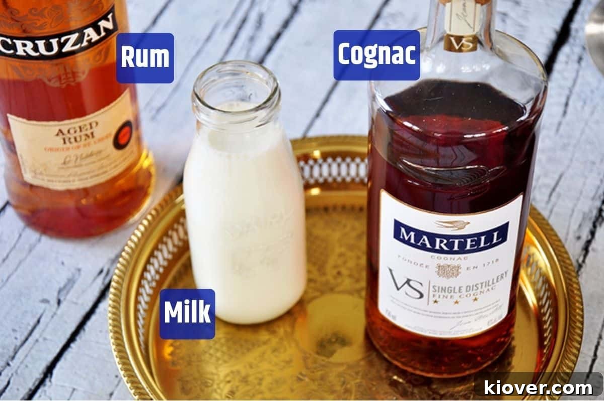 Milk Punch ingredients, including bottles of rum, cognac, and a carton of milk