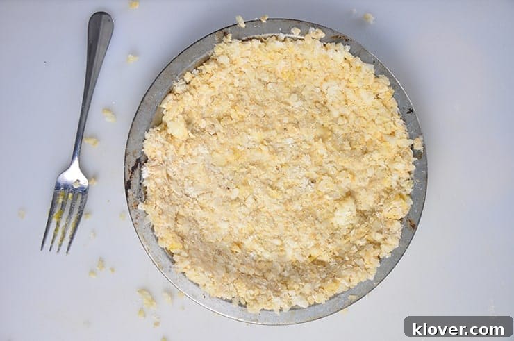 Tater Tot Crust in Pie Tin before putting in oven.
