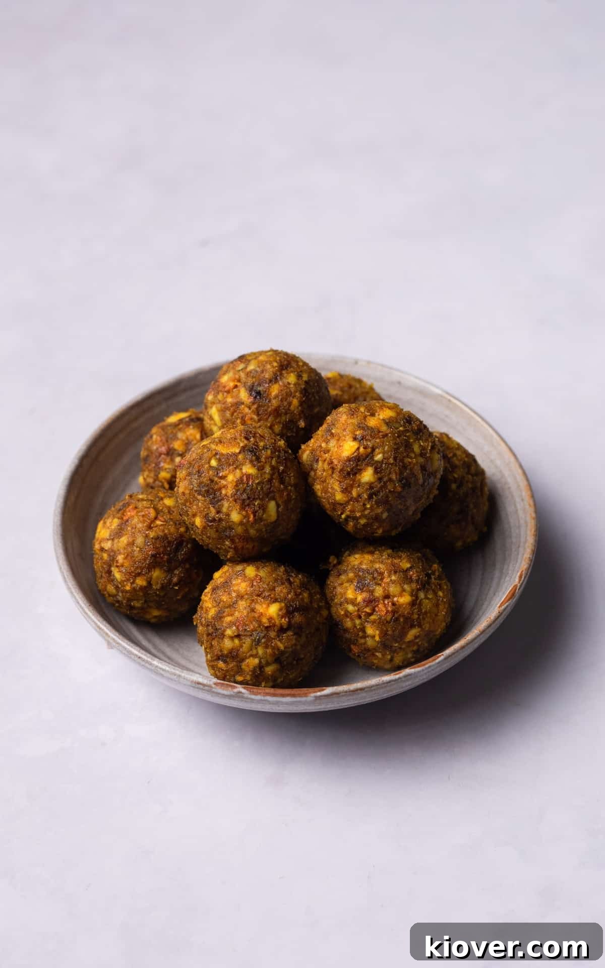 Fuel Bites 7 Close-up of gluten-free and refined sugar-free energy balls, showcasing their texture and healthy appeal.